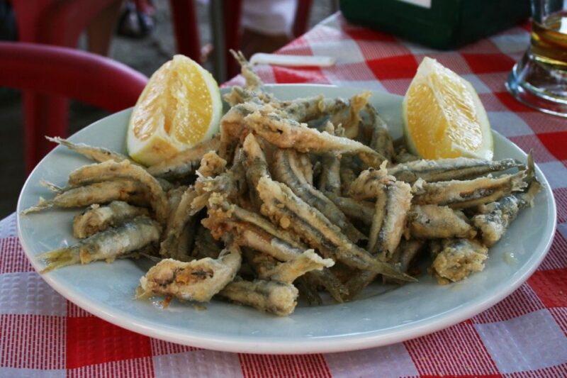 3-Hour Tapas Tour in Triana, Sevillas Vibrant Neighborhood - Guided Experience and Knowledgeable Hosts