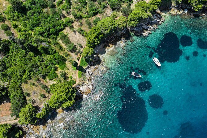3 Island Tour Swim and Snorkel with Drinks on Traditional Boat - Stop 1: Oljak – Croatia’s Smallest Inhabited Island