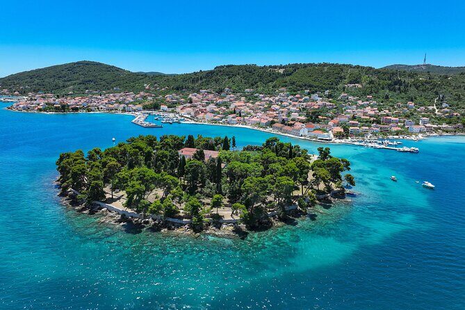 3 Island Tour Swim and Snorkel with Drinks on Traditional Boat - Stop 3: Preko – Island Charm or Hidden Bay