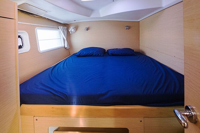 8-Hour Private 38 Catamaran 2-Stop Tour to Cozumel With Food,Open Bar & Snorkel - Catamaran Experience