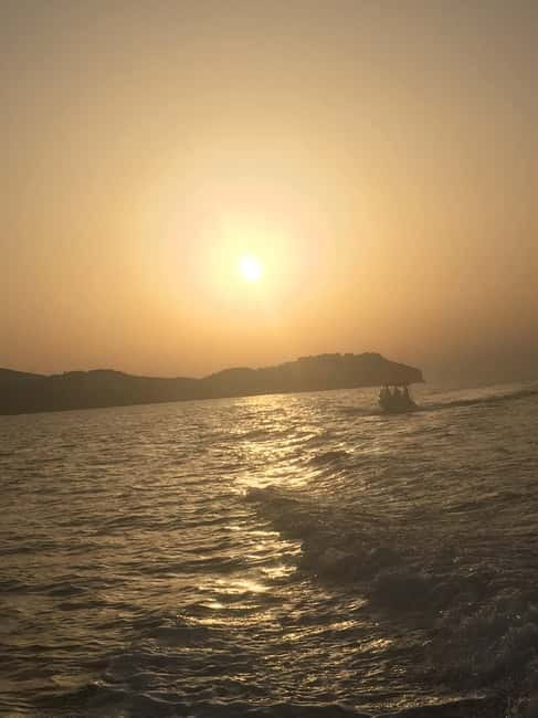 Agia Pelagia: Sunset Motorboat Tour with Soft Drinks - Whats Included and Whats Not
