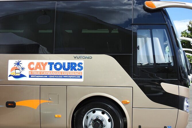 Airport Transfer to West Bay Accommodations (GCM)-Round Trip - The Sum Up