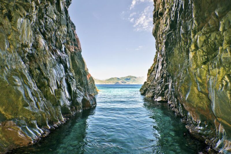 Ajaccio/Porticcio: Scandola Nature Reserve Guided Boat Tour - Discovering the Geology of Calanche De Piana