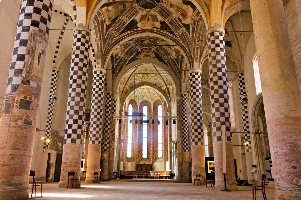 Alba: History Walking Tour and Food Tasting With a Local - Discovering Albas Ancient Roots