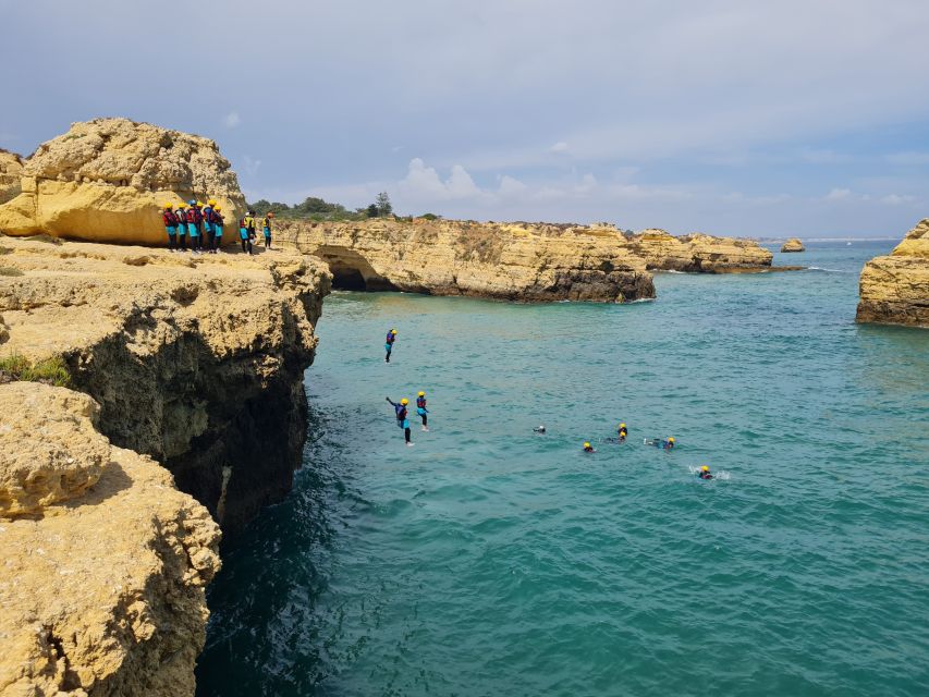 Albufeira: Guided Coasteering Tour With Cliff Jumping - Navigating Caves and Crevices