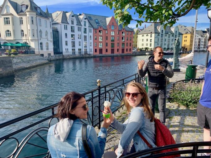 Alesund Private Sightseeing Tour on Foot and by Car - Local Insights