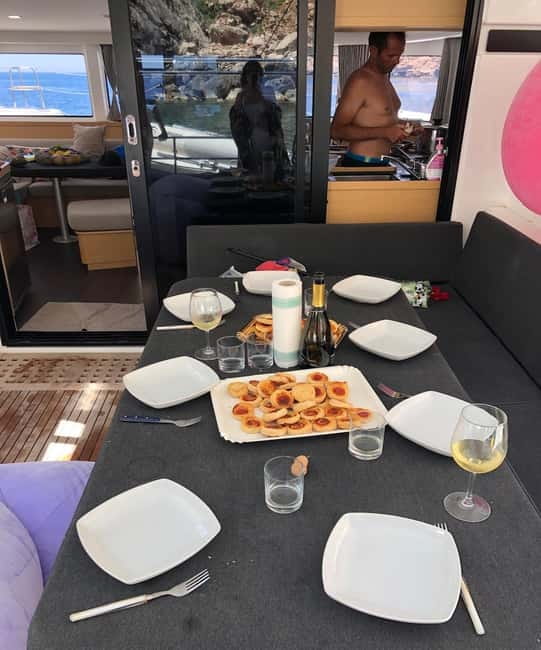 Alghero: Catamaran Cruise with Lunch and Snorkeling - The Value of This Experience