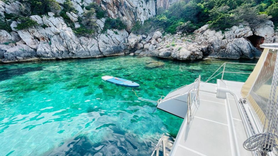 Alghero: Full Day on a Catamaran in Porto Conte Natural Park - Snorkeling at Cala Inferno