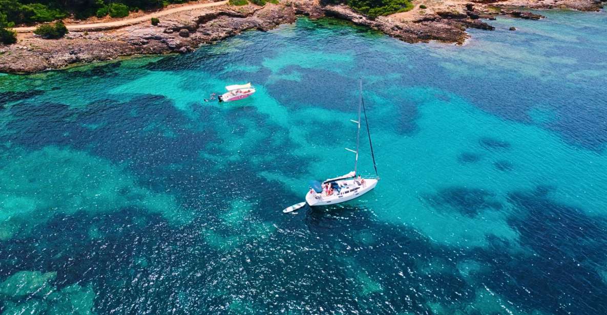 Alghero: Sailboat Excursion in Porto Conte Bay With Lunch - Swimming and Snorkeling