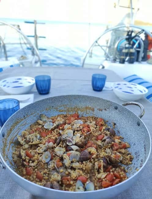 Alghero: Sailing Boat Trip with Skipper, Hostess, and Lunch - The Experience in Detail
