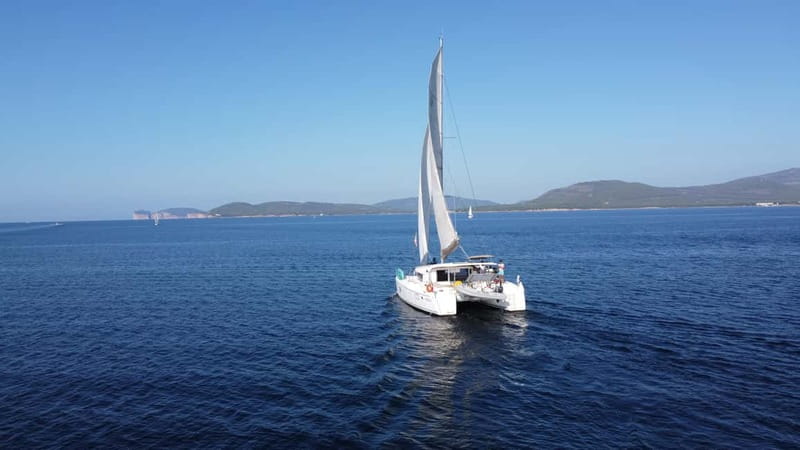 Alghero: Sailing catamaran day trip with lunch - The Itinerary: What to Expect on Your Day at Sea