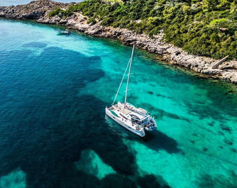Alghero: Sailing catamaran day trip with lunch - Authentic and Intimate Experience