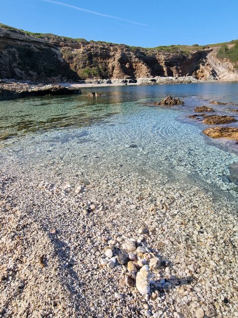 Alghero: Secret Beaches & Coastal tour by Land - The Guided Experience: Knowledgeable and Passionate Guides