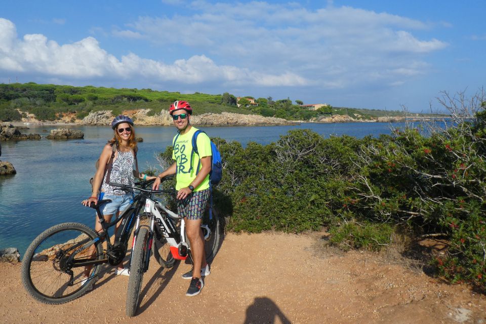 Alghero: Small Beaches Bicycle Tour - Visiting World War II Settlement