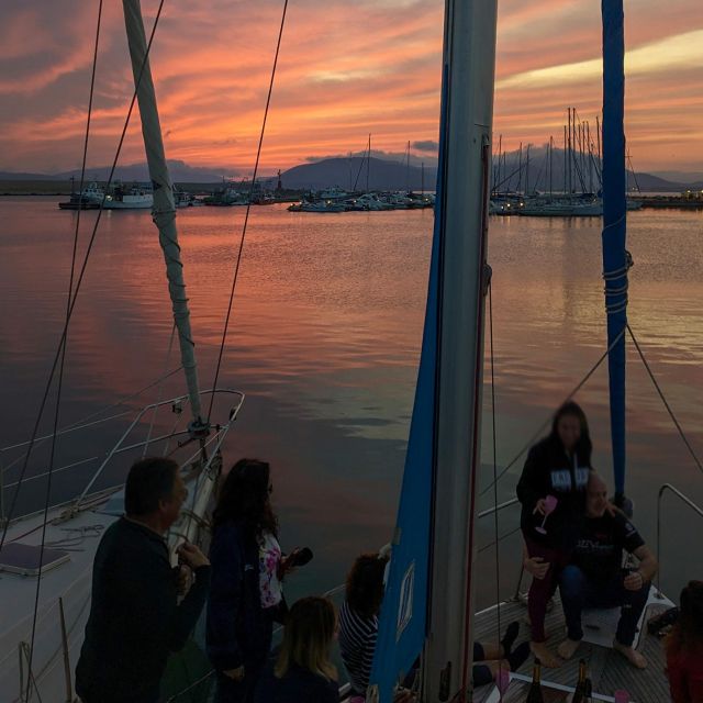 Alghero: Sunset Aperitif Sailing Boat Experience - What to Bring
