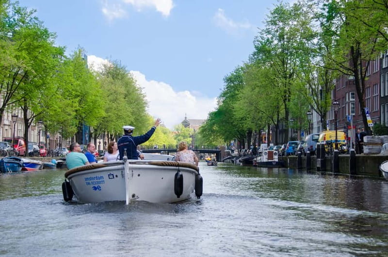 Amsterdam: 75 minute Open Boat Canal Cruise with Live Guide - Key Points