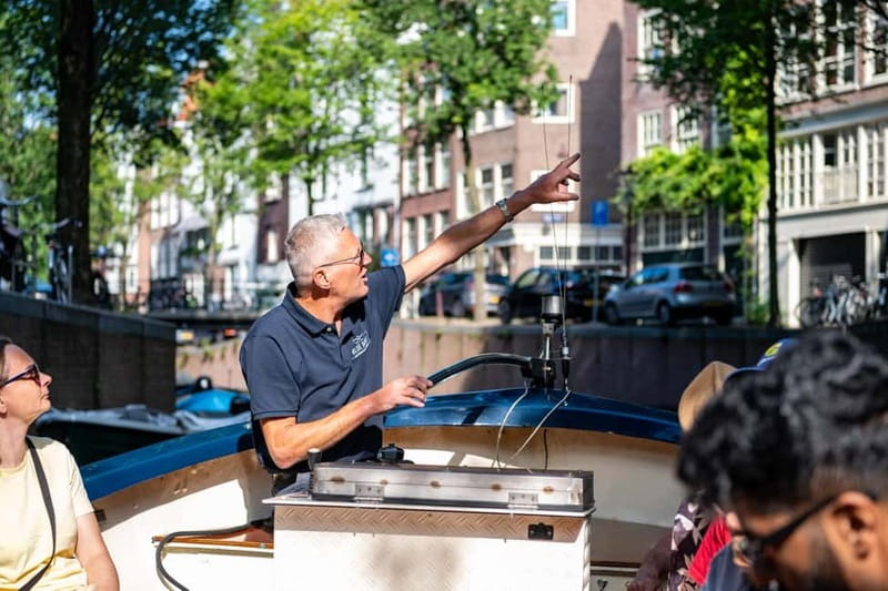 Amsterdam: 75 minute Open Boat Canal Cruise with Live Guide - Discovering Amsterdam’s Waterways