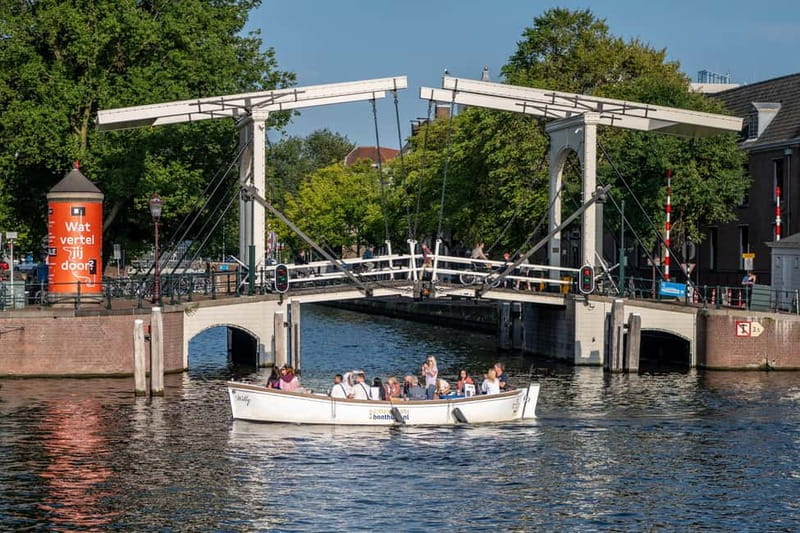 Amsterdam: 75 minute Open Boat Canal Cruise with Live Guide - Comparing with Other Options