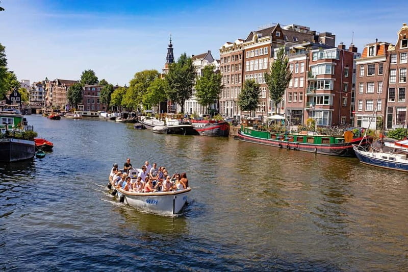 Amsterdam: 75 minute Open Boat Canal Cruise with Live Guide - Who Should Consider This Tour