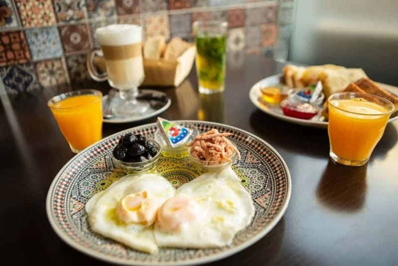 Amsterdam: Breakfast & True Amsterdam Experience Tour - A Closer Look at the Experience