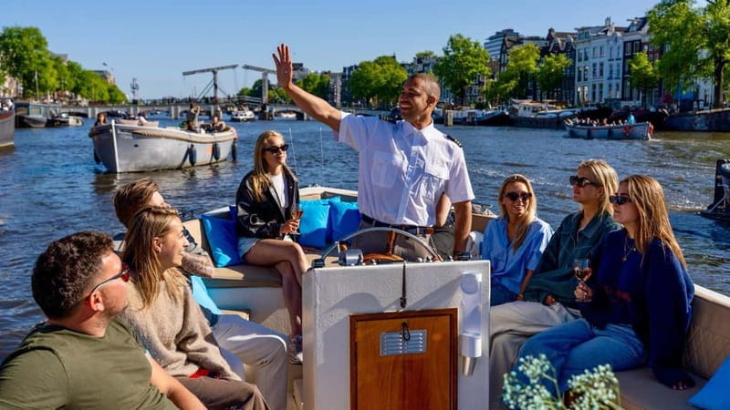 Amsterdam: Canal Cruise in Open Boat with Drink Option - The Sum Up
