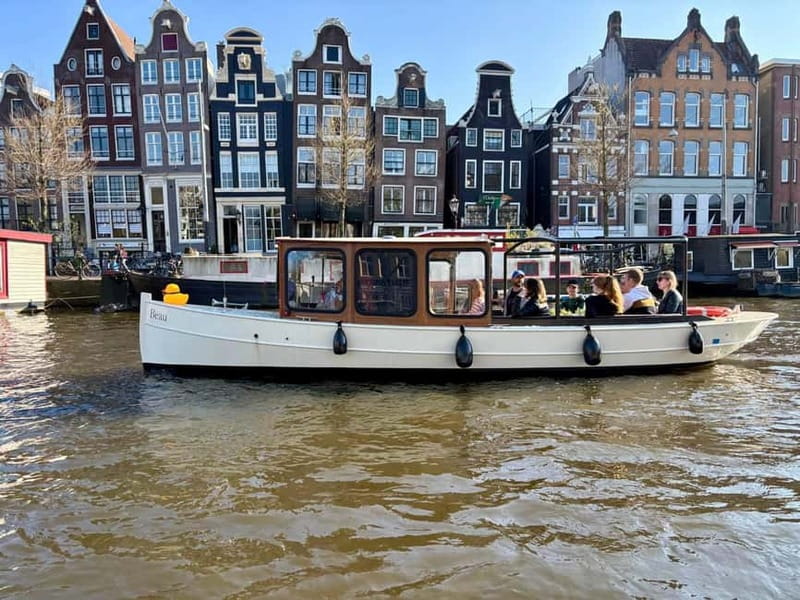 Amsterdam Daytime Boat Private Canal Cruise Tour With Guide - Comfort and Weather Considerations
