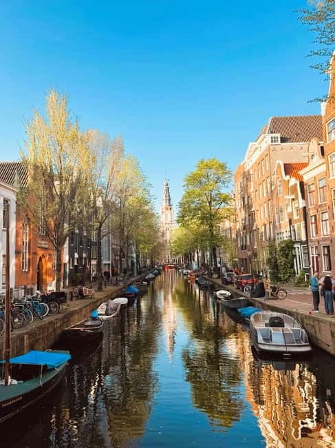Amsterdam: Guided bike tour in French off the beaten track - Key Points  