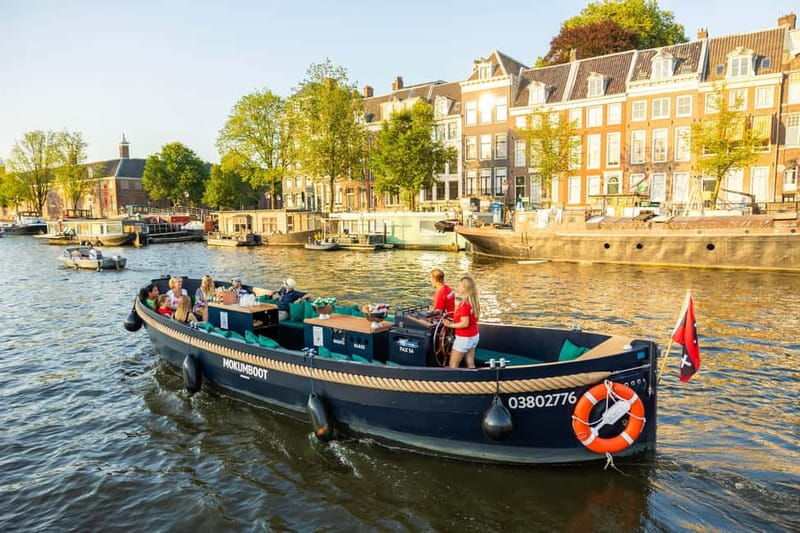 Amsterdam: Guided Open Boat Canal Cruise Including Drink - FAQ