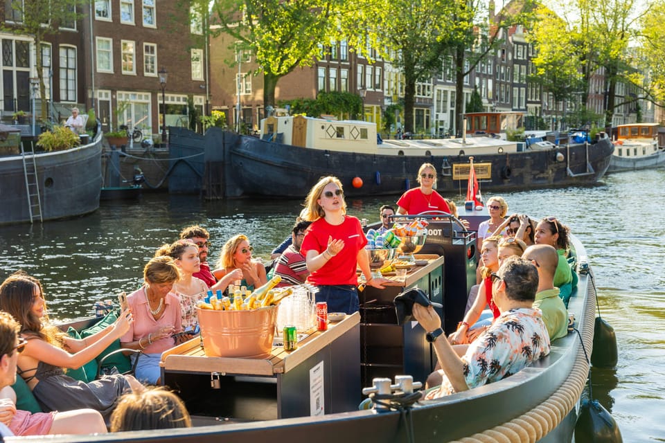 Amsterdam: Guided Open Boat Canal Cruise Including Drink - The Experience: What to Expect on the Canal