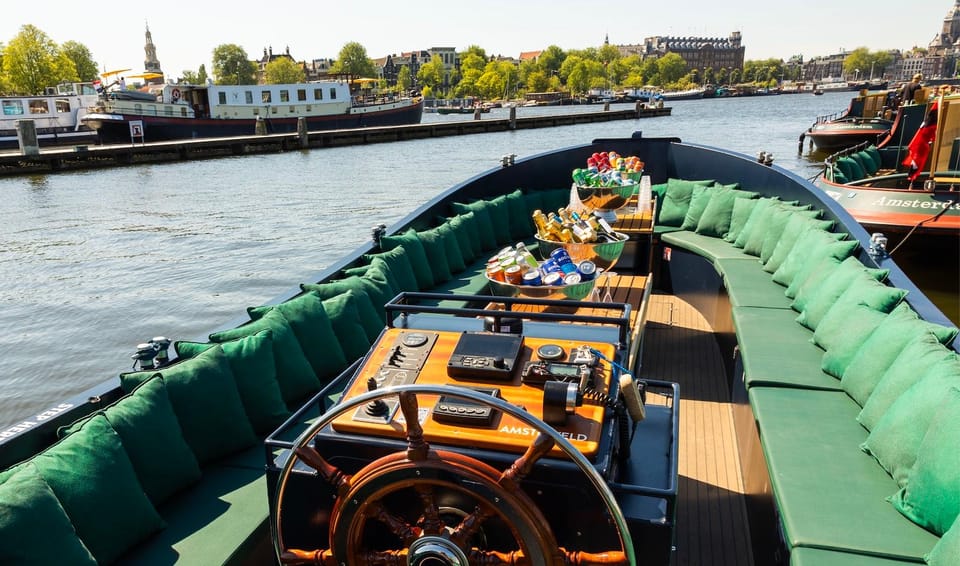 Amsterdam: Guided Open Boat Canal Cruise Including Drink - FAQs