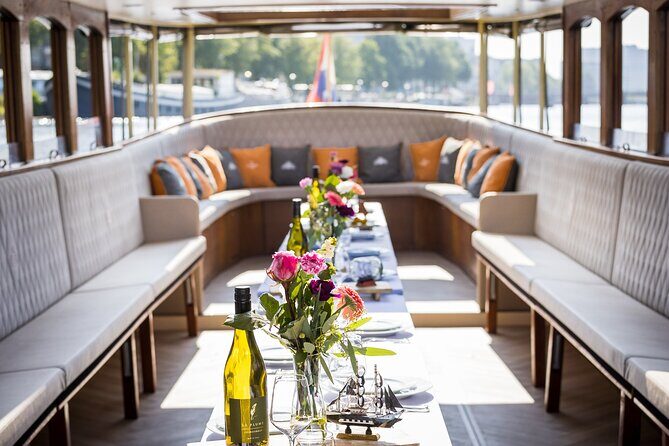 Amsterdam Historic Tour On Classic Saloon Boat - Key Points