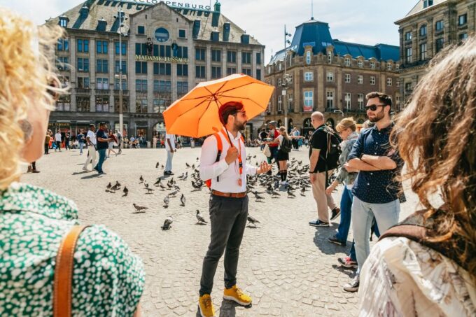 Amsterdam: Historical Highlights Walking Tour With Tasting - Pricing and Cancellation Policy