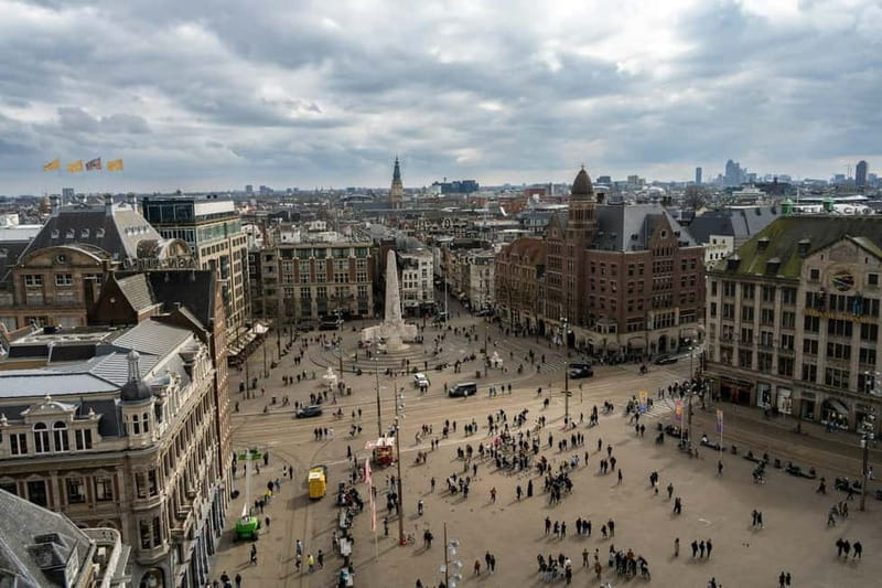 Amsterdam: Iconic Canals & Historic Sights Walking Tour - Authentic Insights from Past Participants