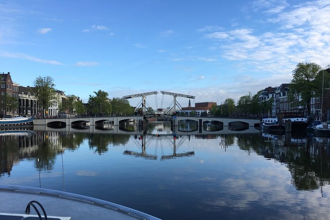 Amsterdam Morning Canal Cruise With Coffee and Tea - Small Group Experience