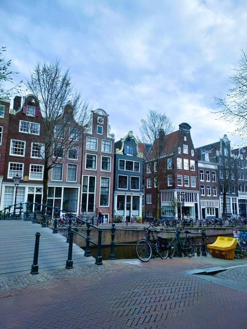 Amsterdam: Off the Beaten Path Bike Tour in French - The Itinerary in Detail