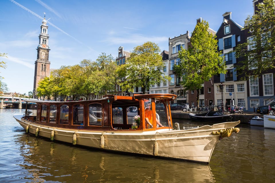 Amsterdam: Open Boat Cruise option Unlimited Drinks & Bite - Key Points