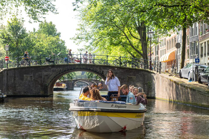Amsterdam: Open Boat Tour of Canals with Expert Local Guide - Practical Tips for Your Cruise