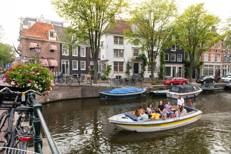 Amsterdam: Open Boat Tour of Canals with Expert Local Guide - Authentic Insights from Reviews