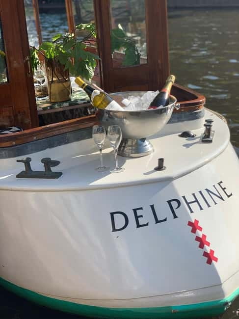 Amsterdam: Private Dinner Cruise with Guide and Wine - The Experience: A Step-by-Step Overview