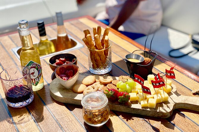 Amsterdam Small-Group Canal Cruise Including Snacks and Drinks - Inclusions