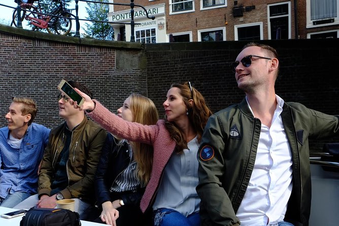 Amsterdam Small-Group Canal Cruise Including Snacks and Drinks - Booking and Cancellation