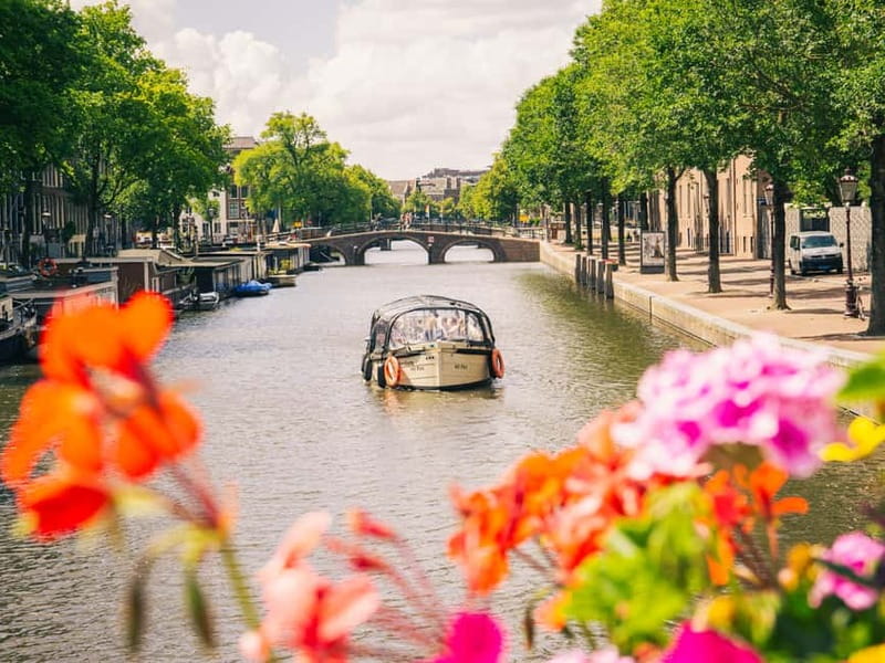 Amsterdam: Spanish Guided Open Boat Cruise with Bar Onboard - Practical Details and Tips