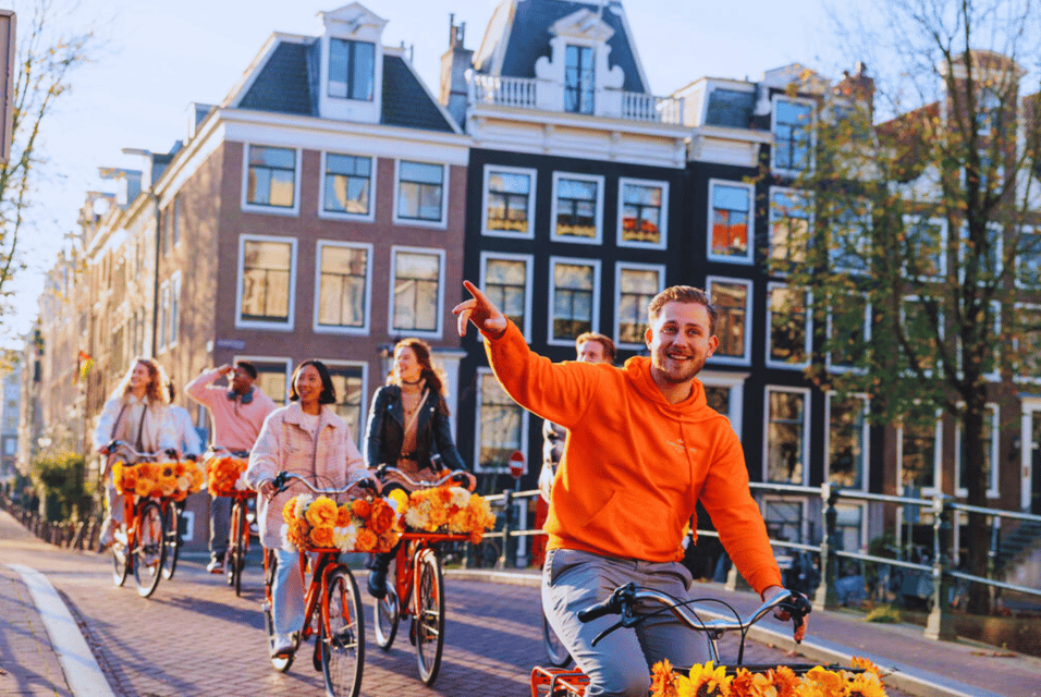 Amsterdam: Top Highlights Guided Bike Tour EN/DE/ES/FR/IT/CN - Key Points