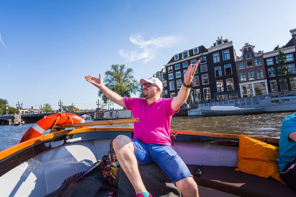 Amsterdam:1.5-Hour Canal Cruise local Guide, Drinks & Snacks - A Closer Look at the Tour Experience