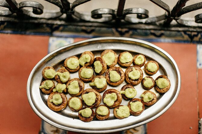 An Evening Out in Seville: Triana Neighborhood Tapas Tour - Exploring Sevilles Rich Culinary Traditions