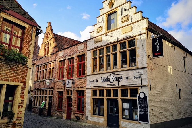 Antwerp and Ghent Day Trip From Brussels With Atomium Photo Stop - Professional English-Speaking Guide