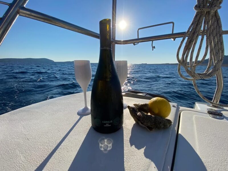 aperitifs at sunset on the Stintino catamaran burianaCharter - Key Points  
