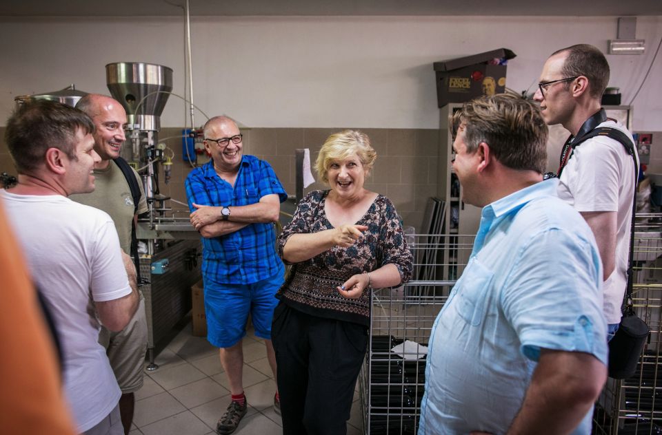 Assisi: Organic Winery Tour With Tastings & Typical Food - Wine and Food Pairing Experience