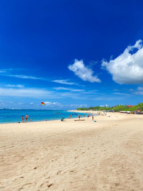 Bali: Sunset Beach and Temple Tour With Fire Dance Show - Water Activities at Tanjung Benoa