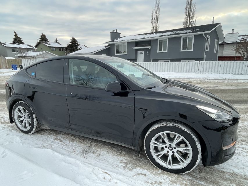Banff to Calgary YYC Airport (Private Transfer With Tesla) - Luggage Assistance by Driver